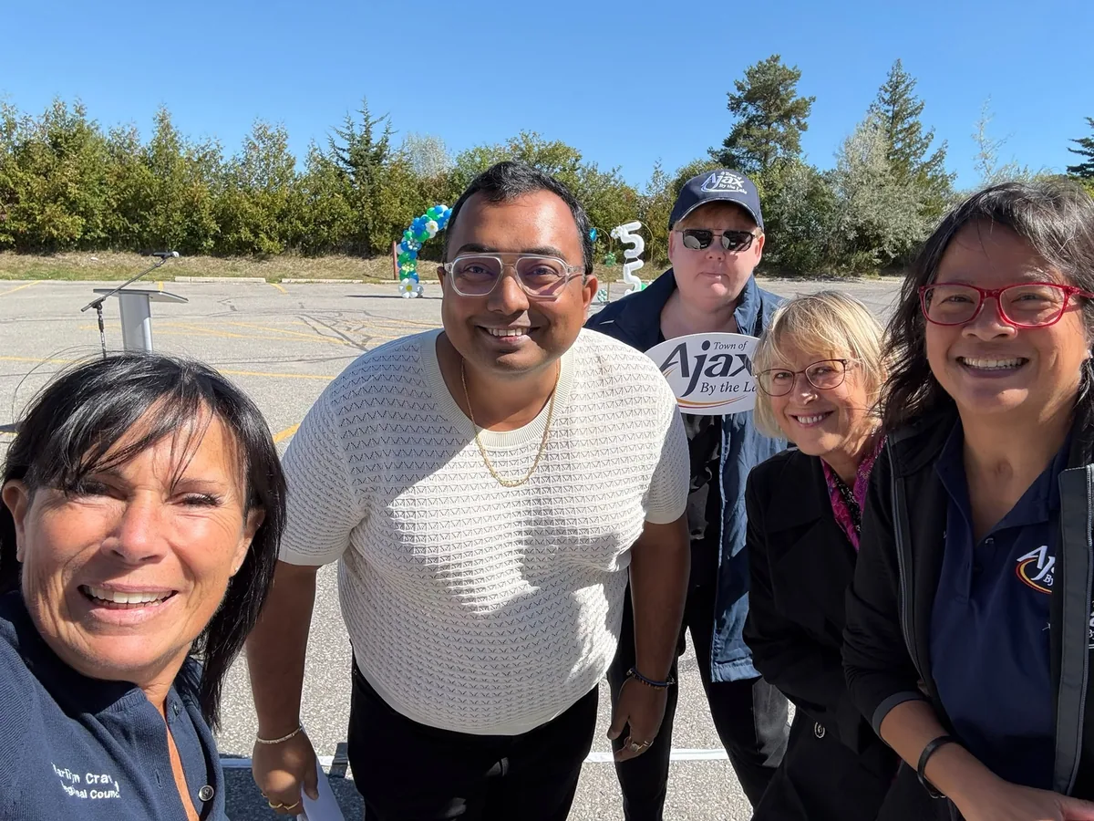 Avik Banerjee awarded best volunteer in the Durham Region by the Community Development Council Durham, seen with community leaders